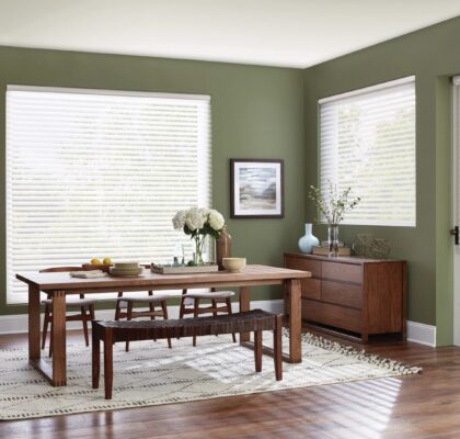 Wooden bench, rug, dresser under bright windows