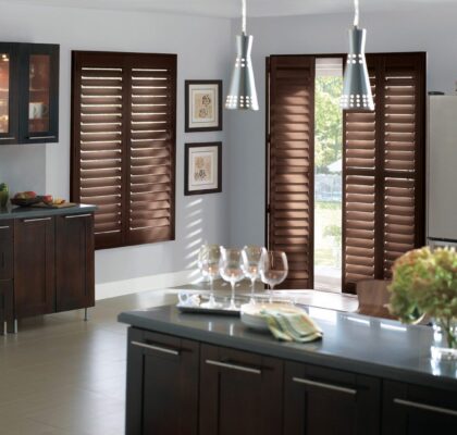 Dark wood kitchen cabinets with shutters