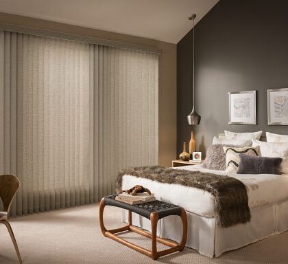 Elegant bedroom with neutral tones and modern decor.